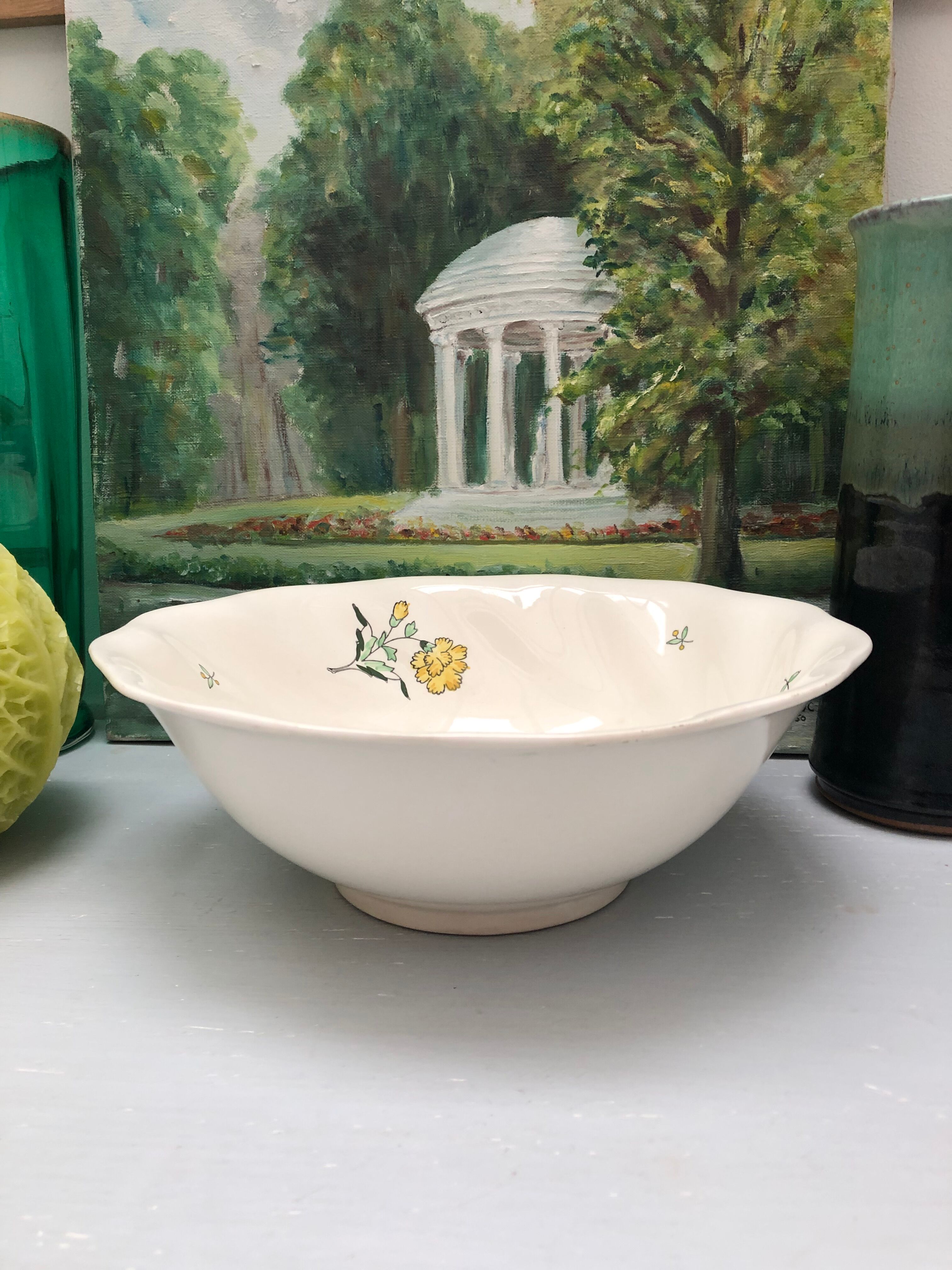 Round dish model embrun, with yellow floral patterns. stamped salins france