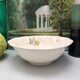 Round dish model embrun, with yellow floral patterns. stamped salins france