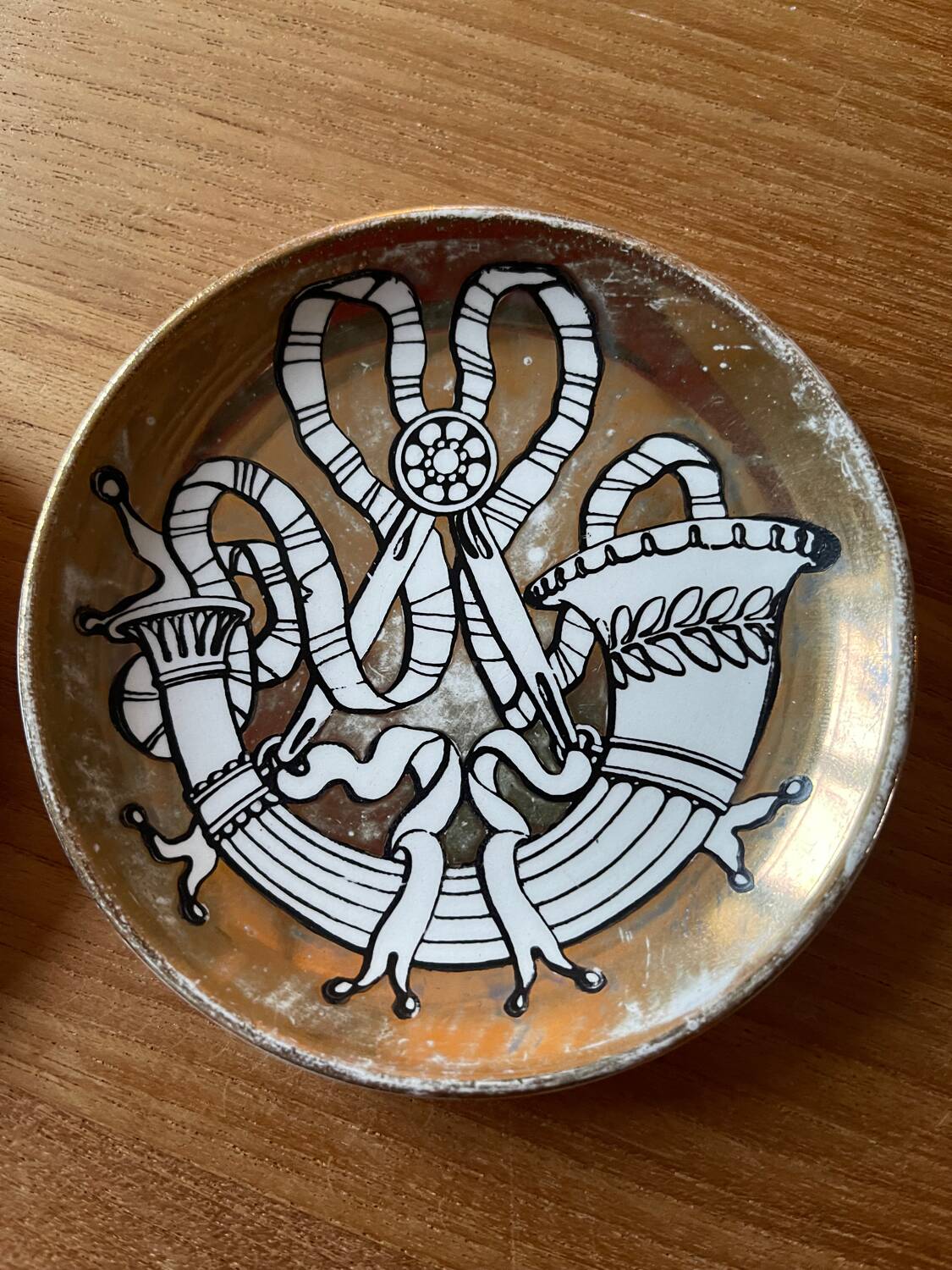 Small Fornasetti plates