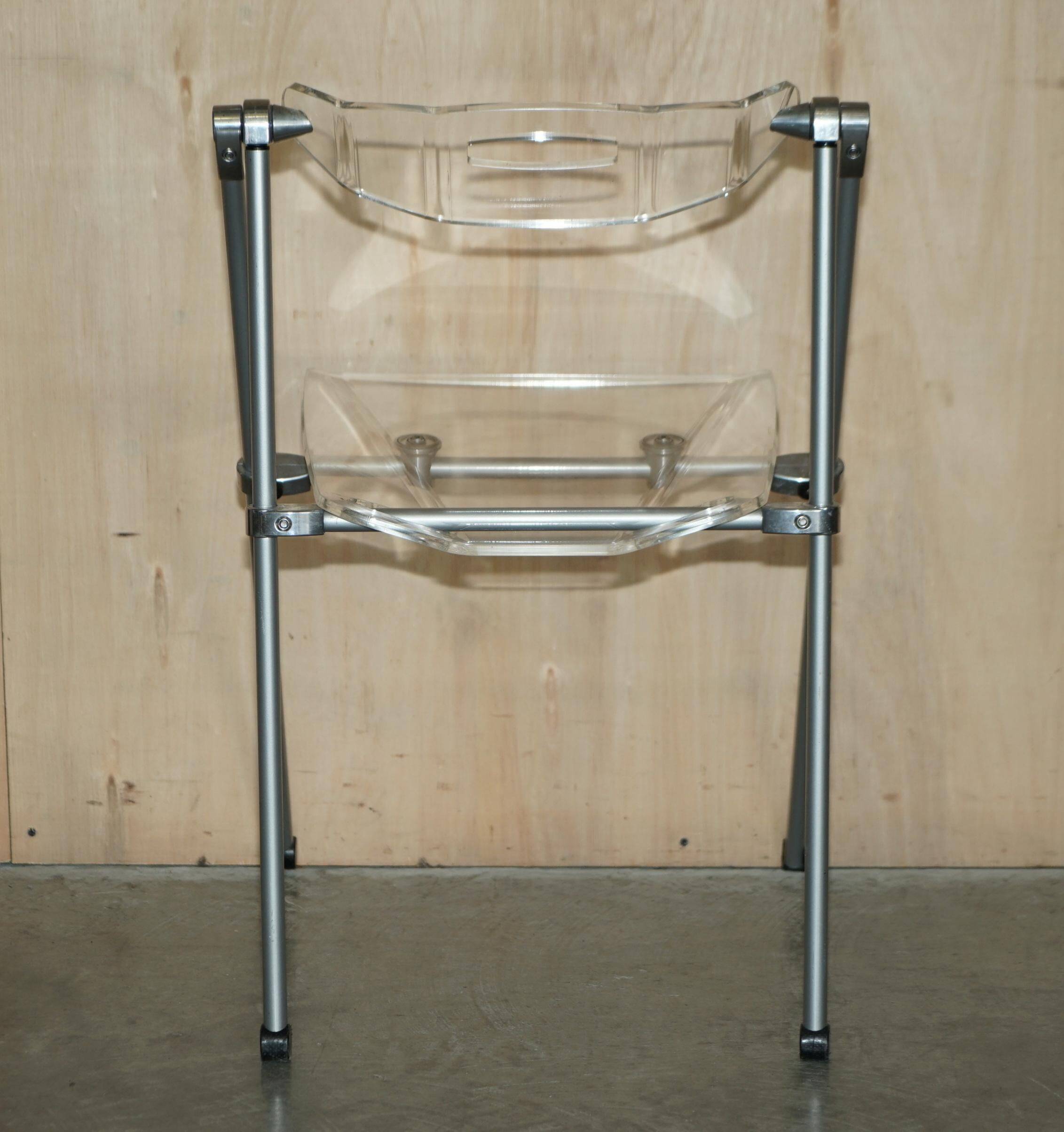 Metal and lucite folding chair, swivel backrest.