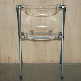 Metal and lucite folding chair, swivel backrest.