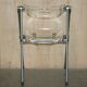 Chaise pliante en métal et lucite, dossier pivotant
