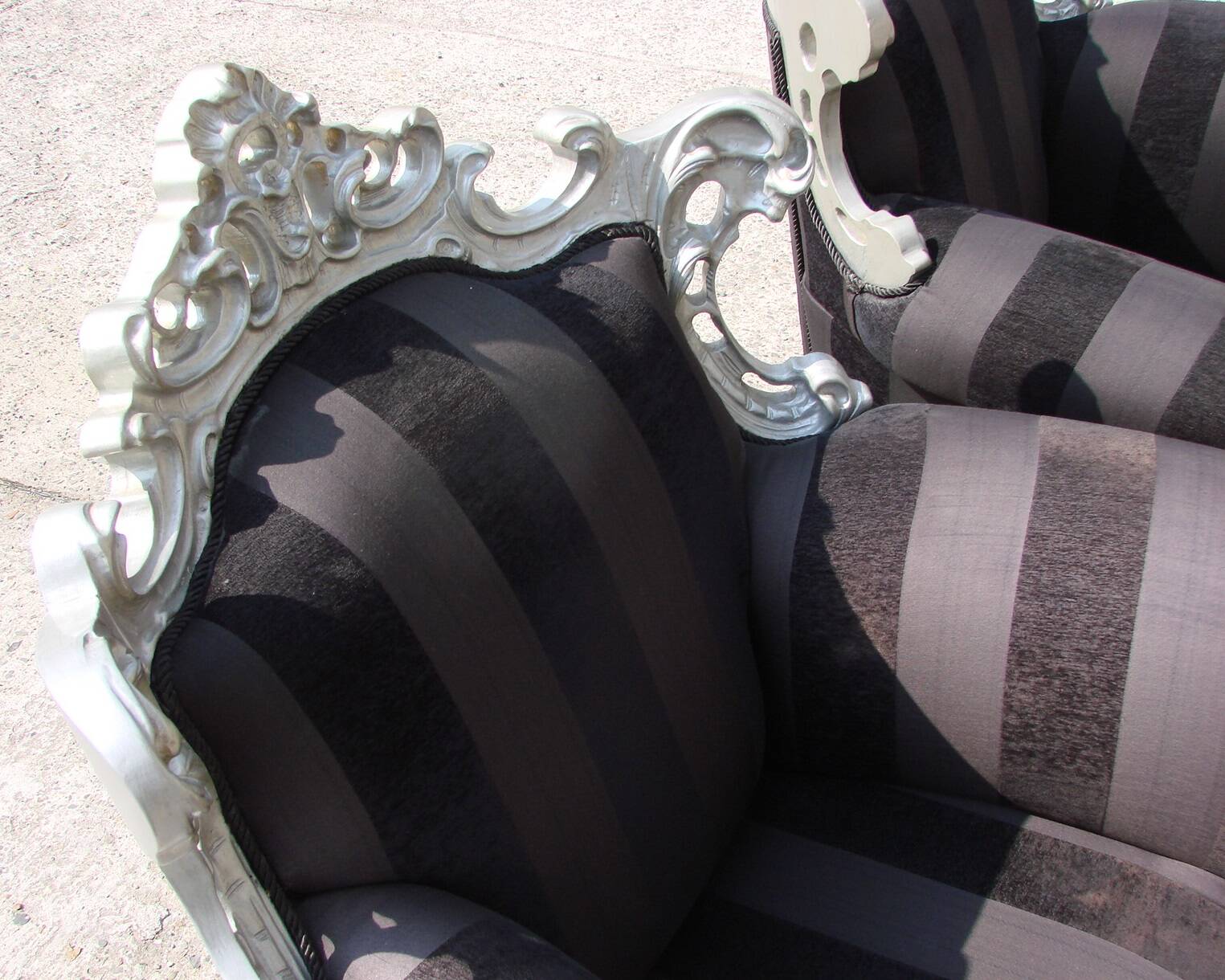 A pair of vintage armchairs, 1980s, lacquered wood and fabric