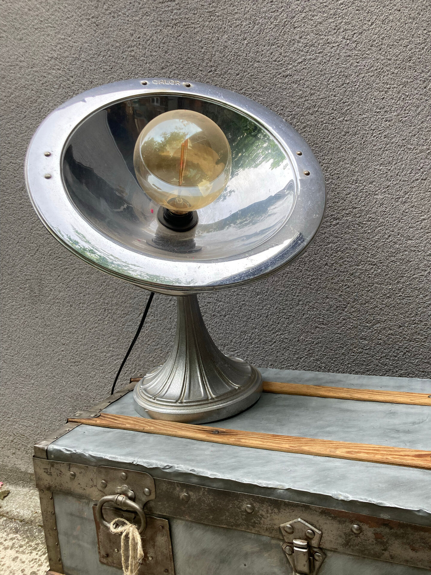 Old zinc trunk with legs, industrial console
