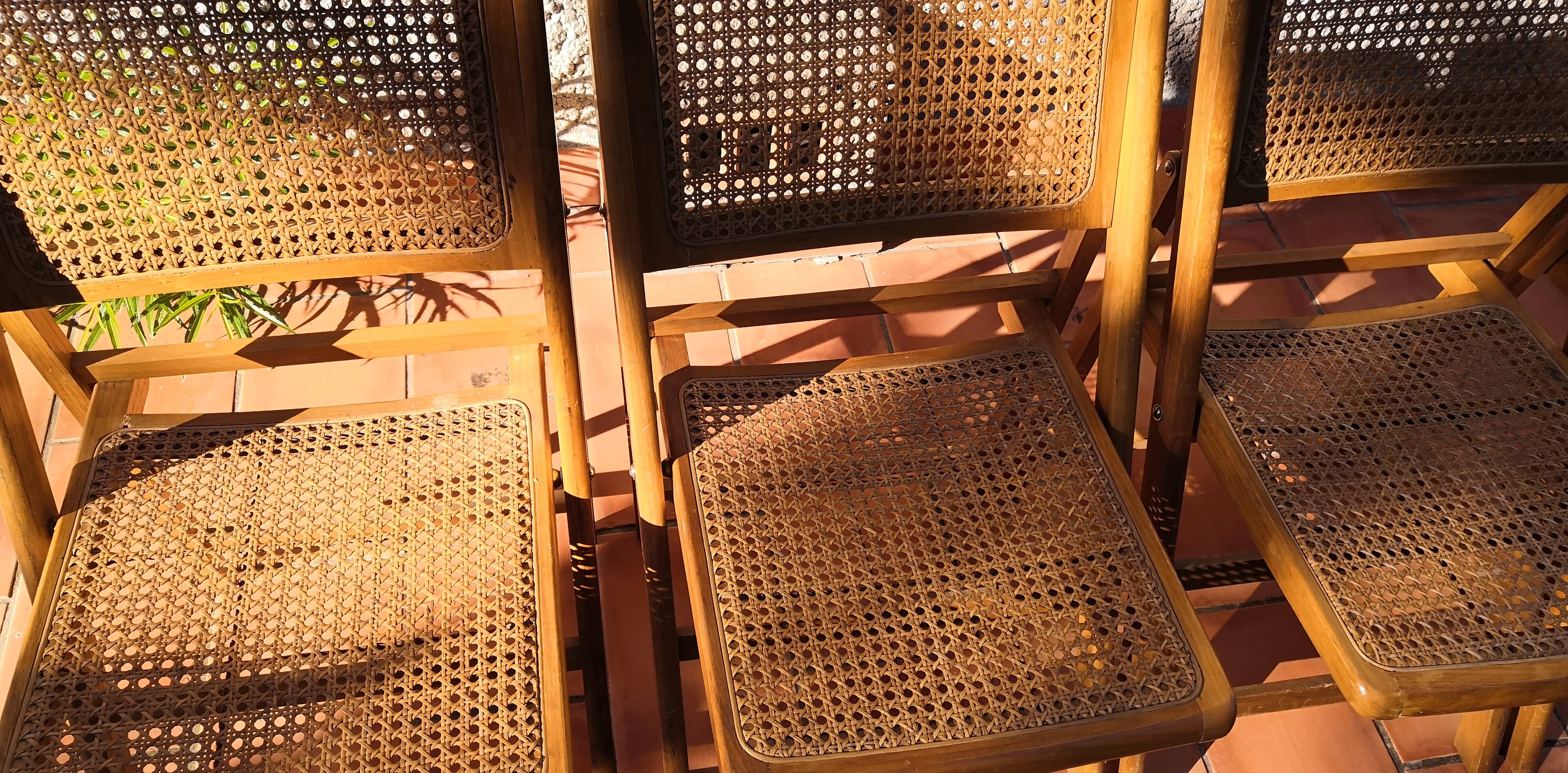 Suite of 4 folding chairs cannage 60s vintage
