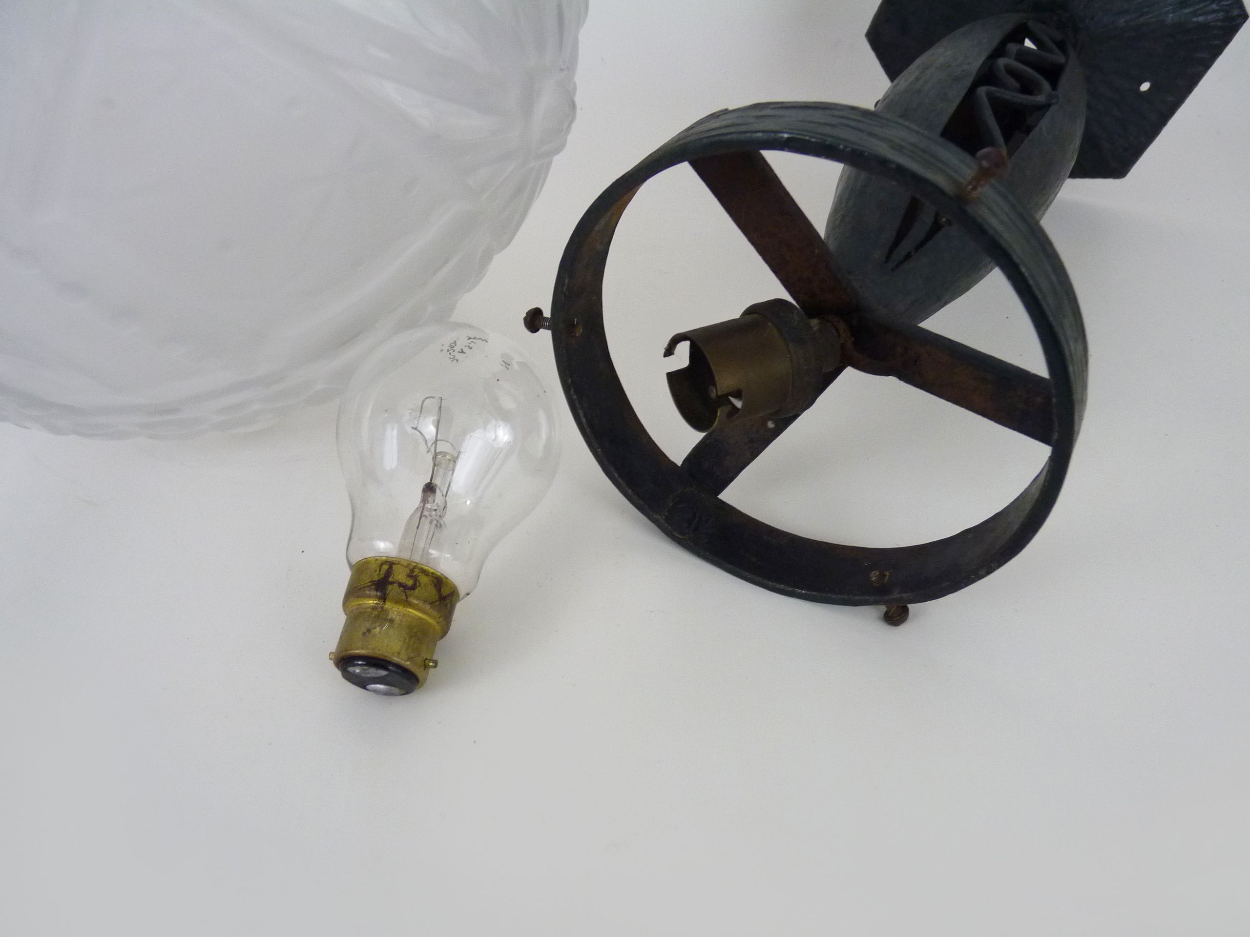 Art Deco hanging lamp in wrought iron Fournet and globe in glass paste