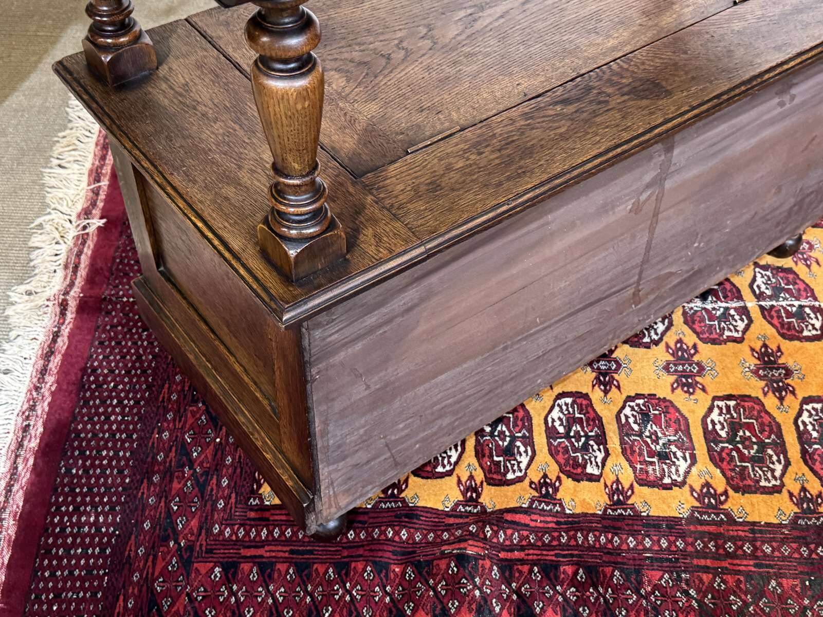 English oak bank safe from the 1930s that can serve as a console.