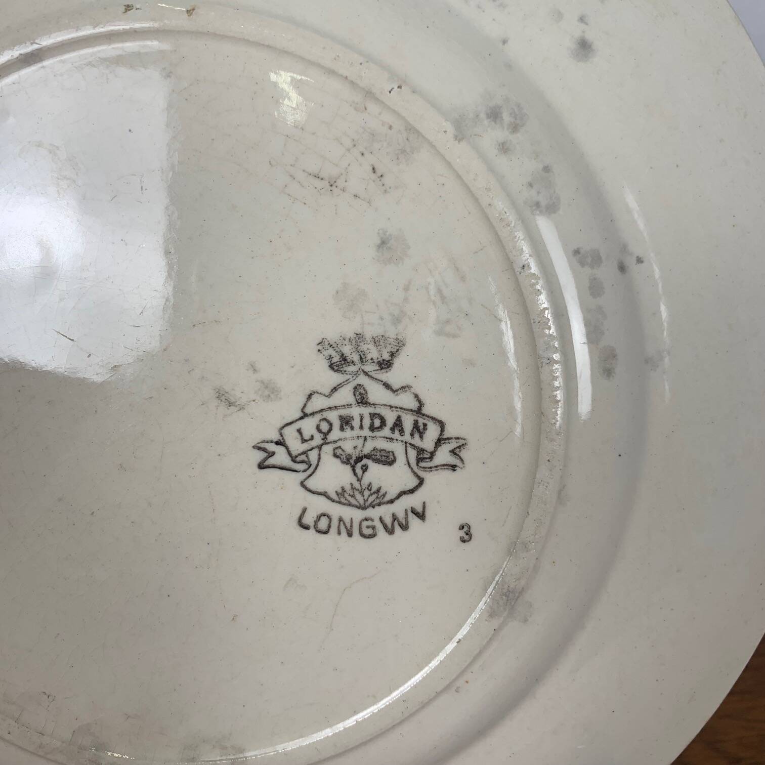 Set of 4 Longwy plates, Loridan model, early 20th century.