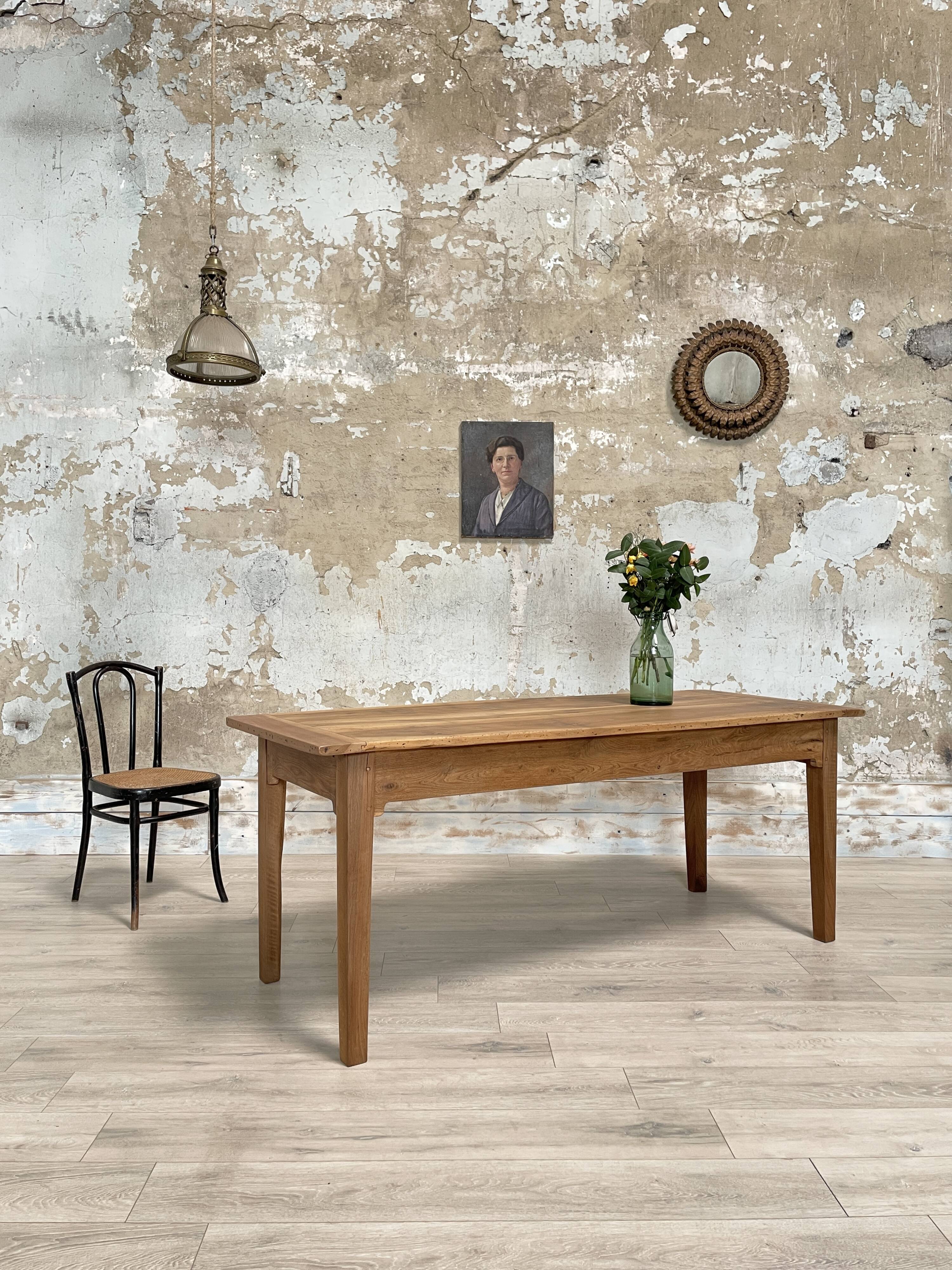 Vintage farmhouse table with spindle legs.