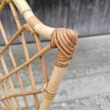 Rattan chair by Louis Sognot 1960