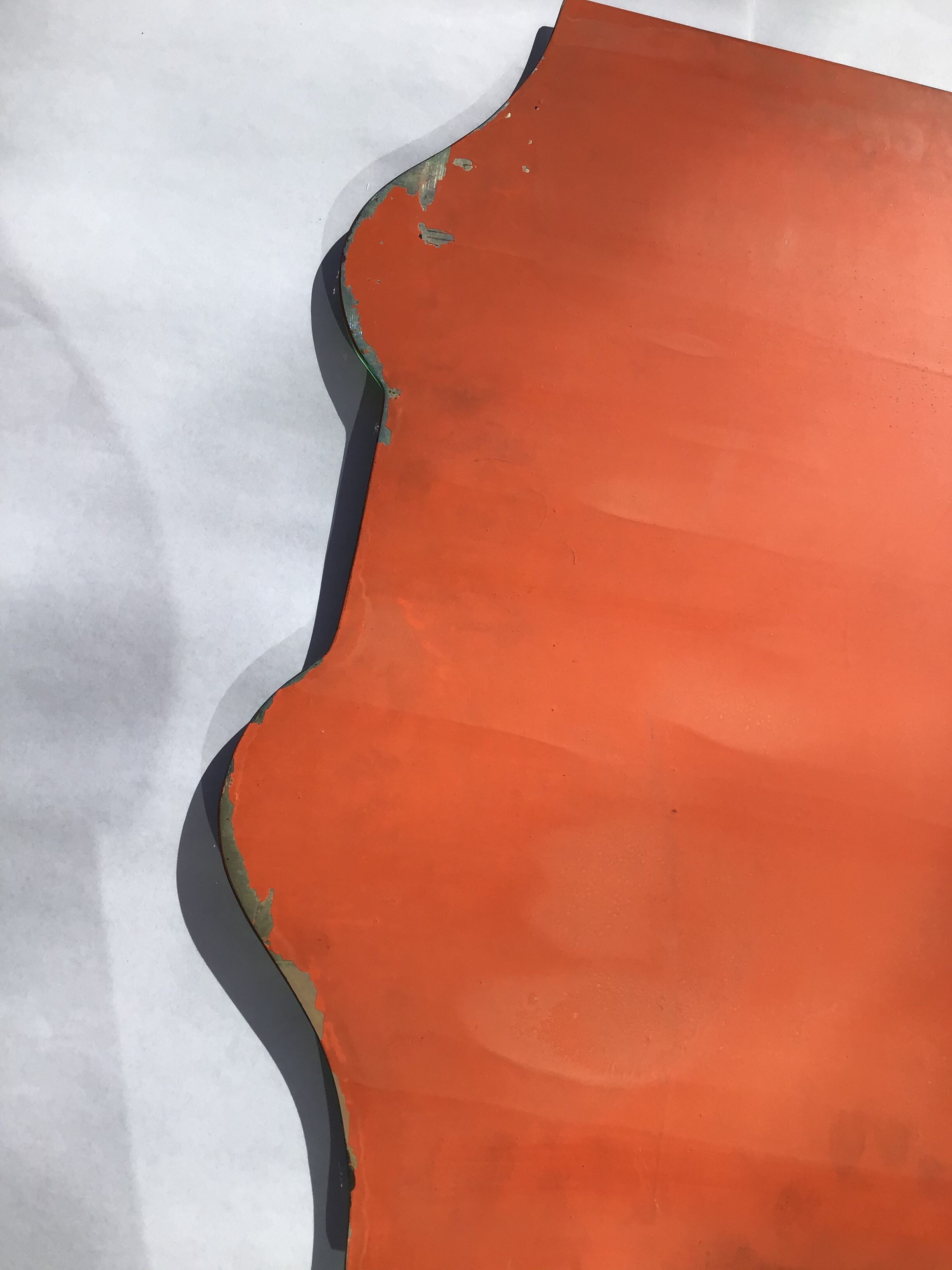 Bevelled mirror trapeze two waves at the top