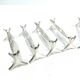 CHRISTOFLE - SET OF 11 SILVER-PLATED KNIFE RESTS