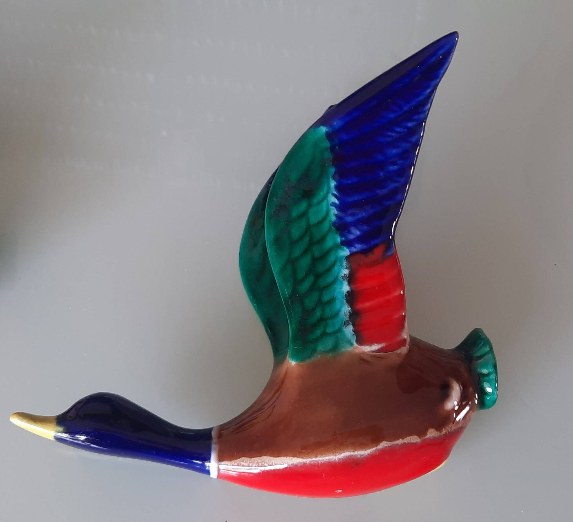 Pair of glazed ceramic wall ducks