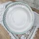 Set of 12 Longwy France earthenware soup plates, Trianon model