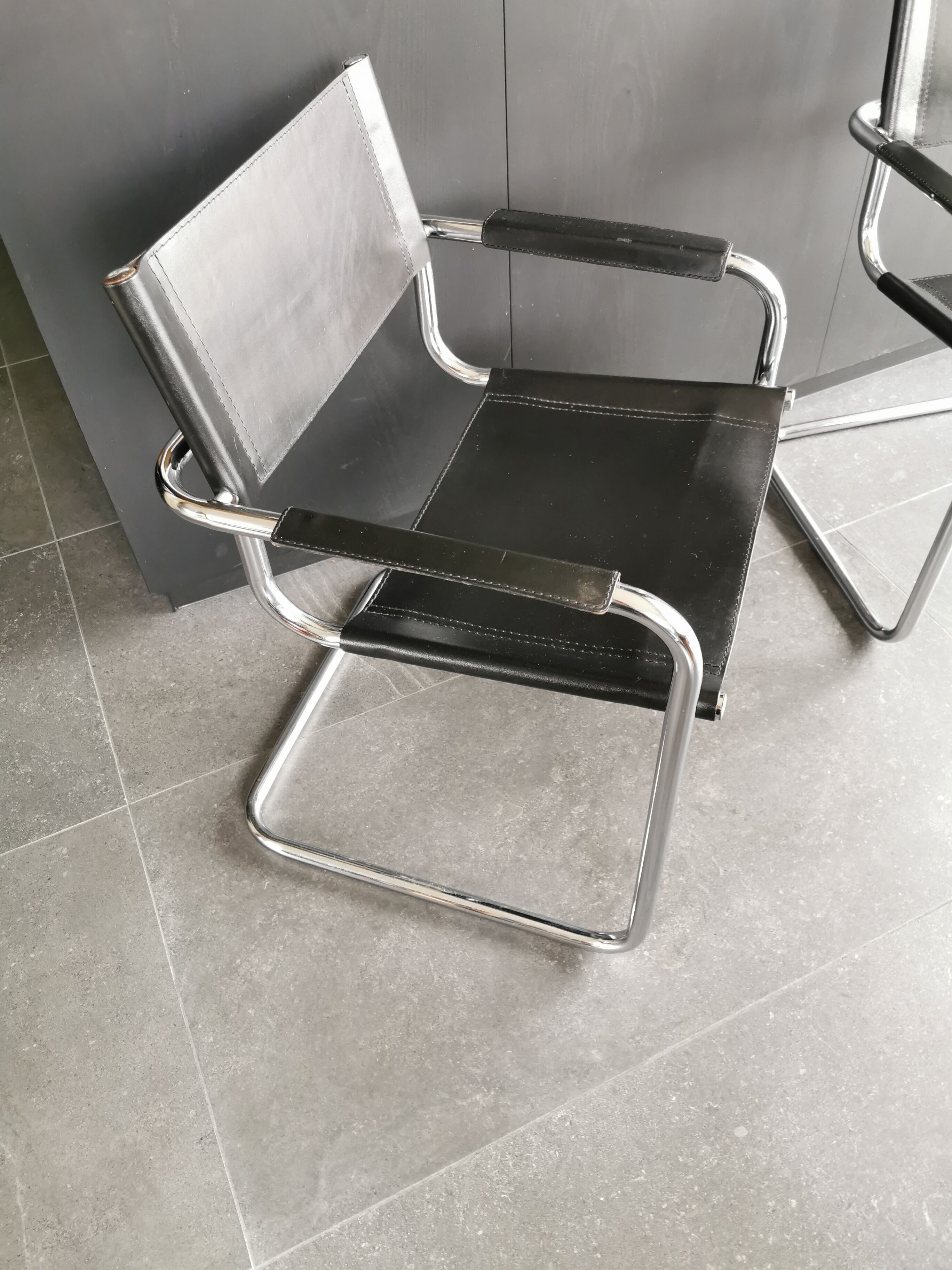 Metal and black leather design armchair pair