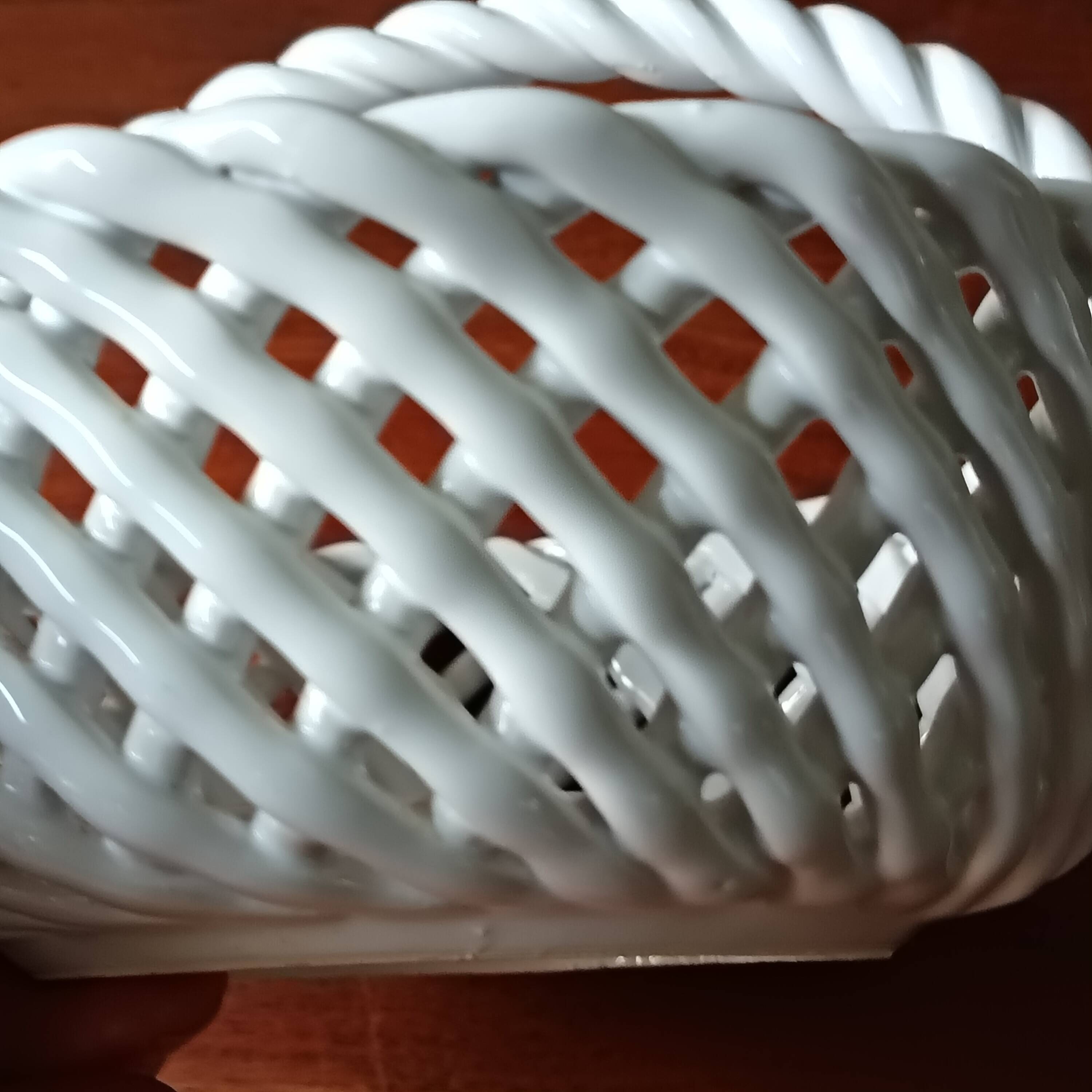 Small white twisted ceramic basket