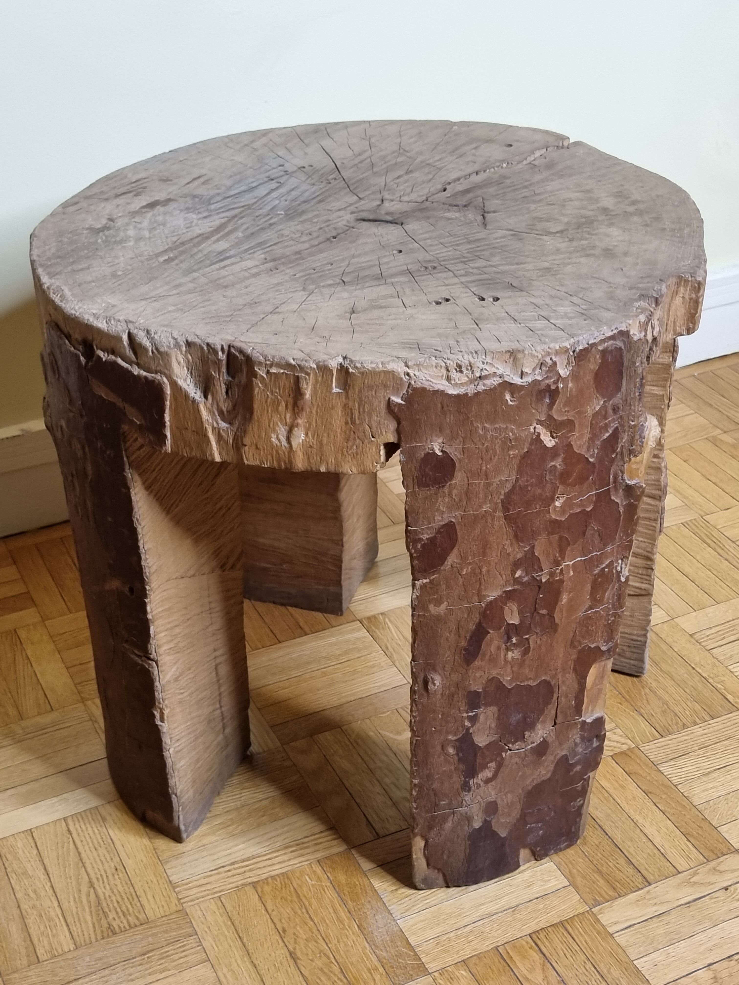 Brutalist solid wood coffee table carved from a room in a plane tree trunk