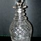 Richly cut crystal decanter and bevelled diamond engraved baccarat or saint-louis? trianon