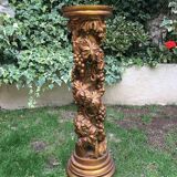 Wooden column in carved wood