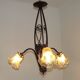 French Art Nouveau Leaf Detail Iron 3 Light Chandelier Amber Glass Shades