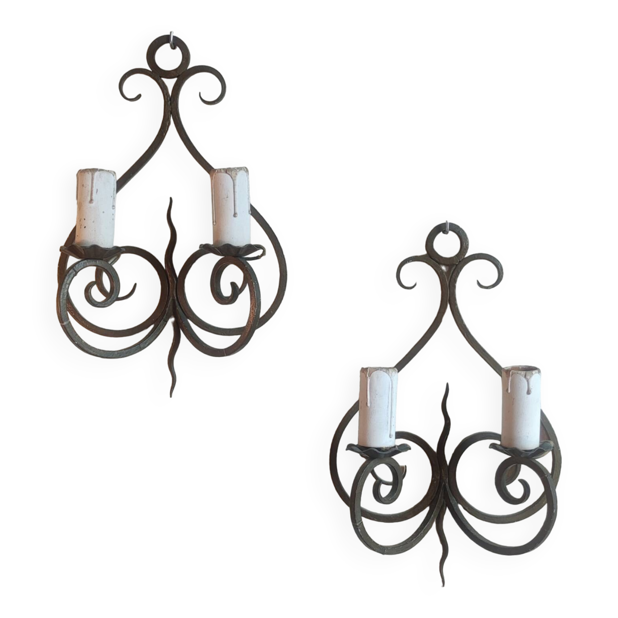 Old pair of wrought iron wall lights