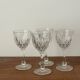 4 cut glass liqueur glasses on stems