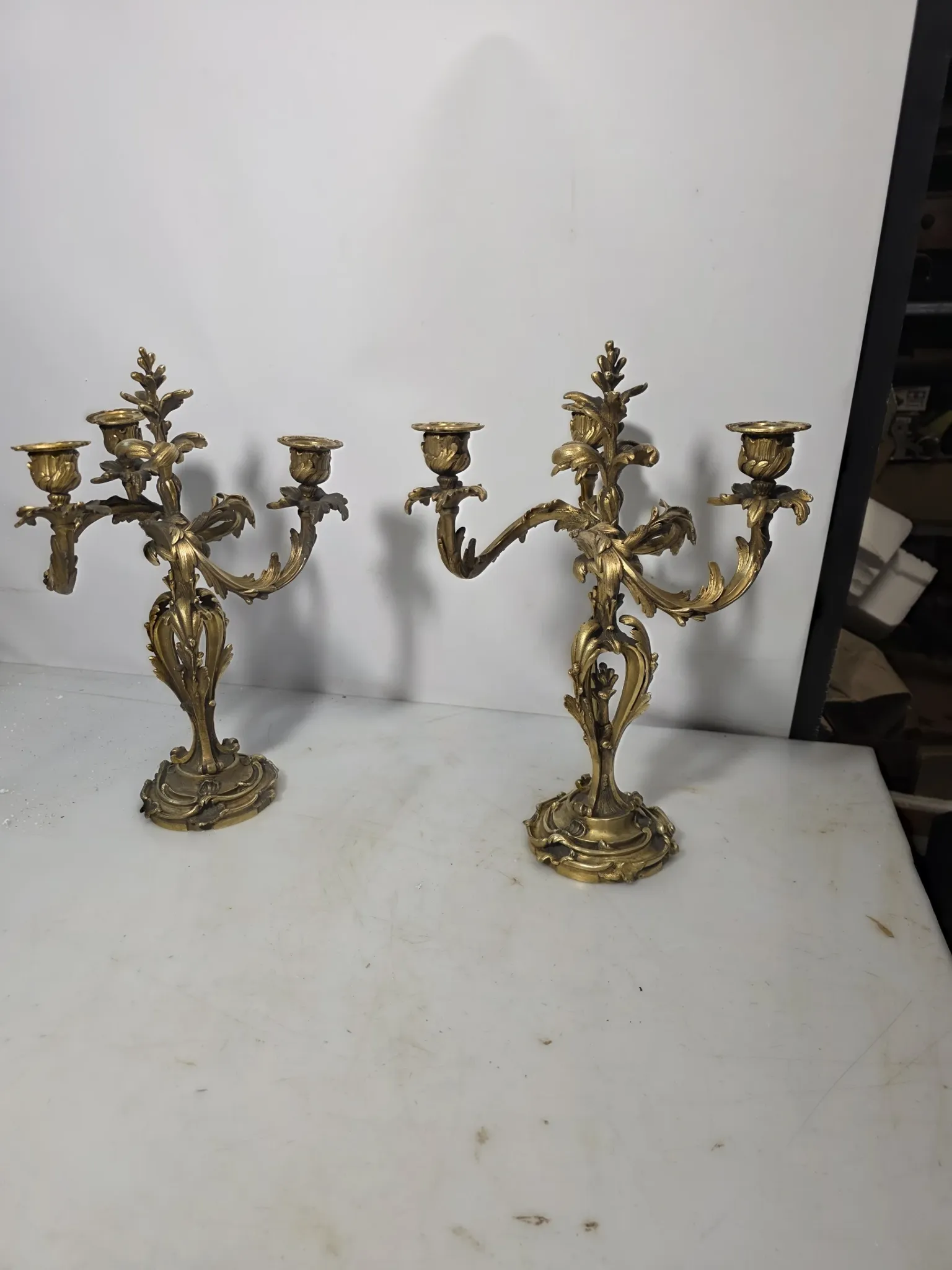 Pair of Louis XV style bronze candlesticks from the 19th century.