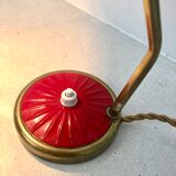 Brass desk lamp with articulated red diabolo lampshade