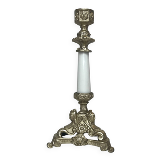 Antique regulated candlestick with a patinated gold finish and porcelain base from the early 20th century.