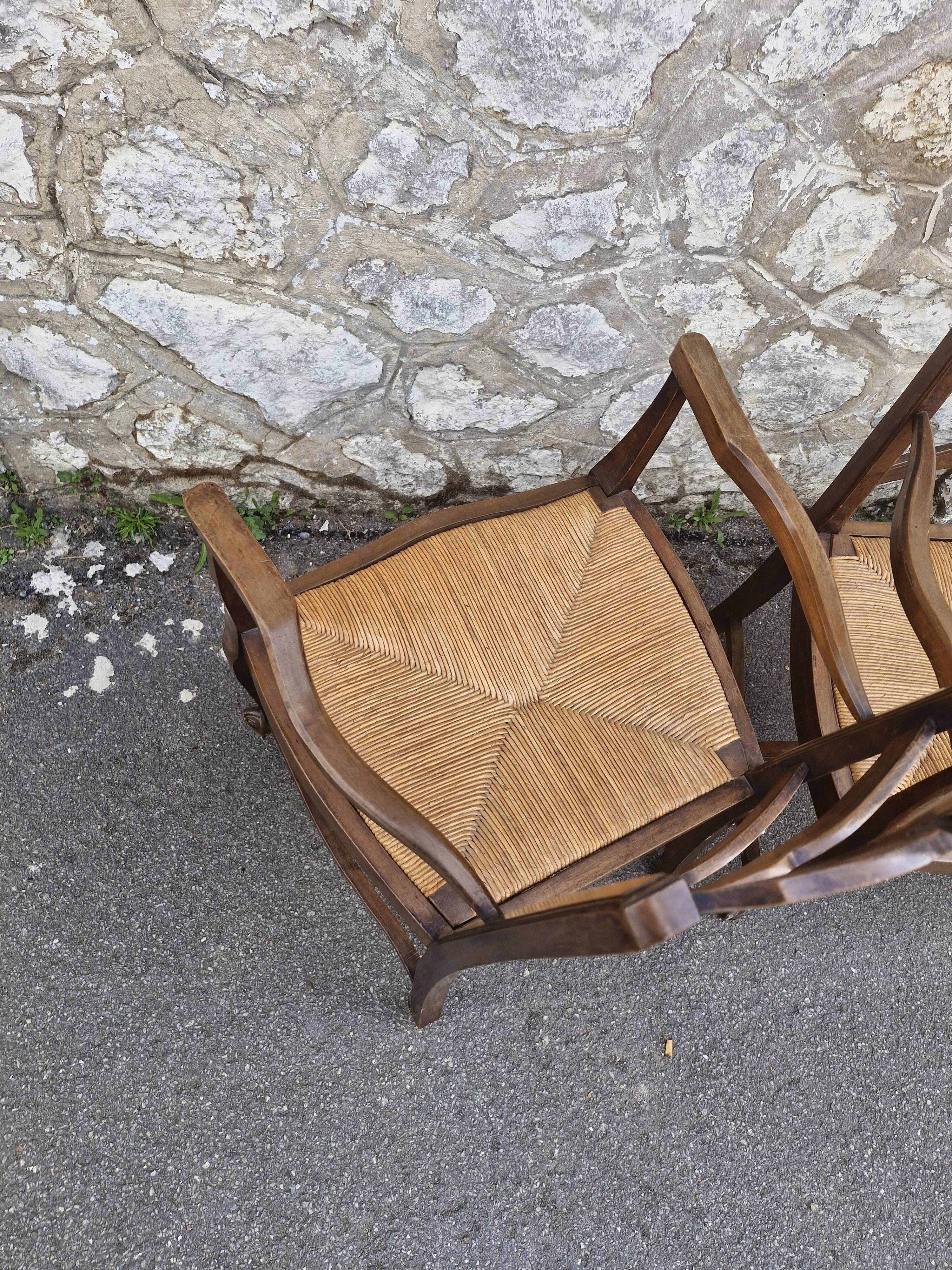 Wood and straw armchairs