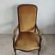 Fauteuil Voltaire garniture de velours jaune