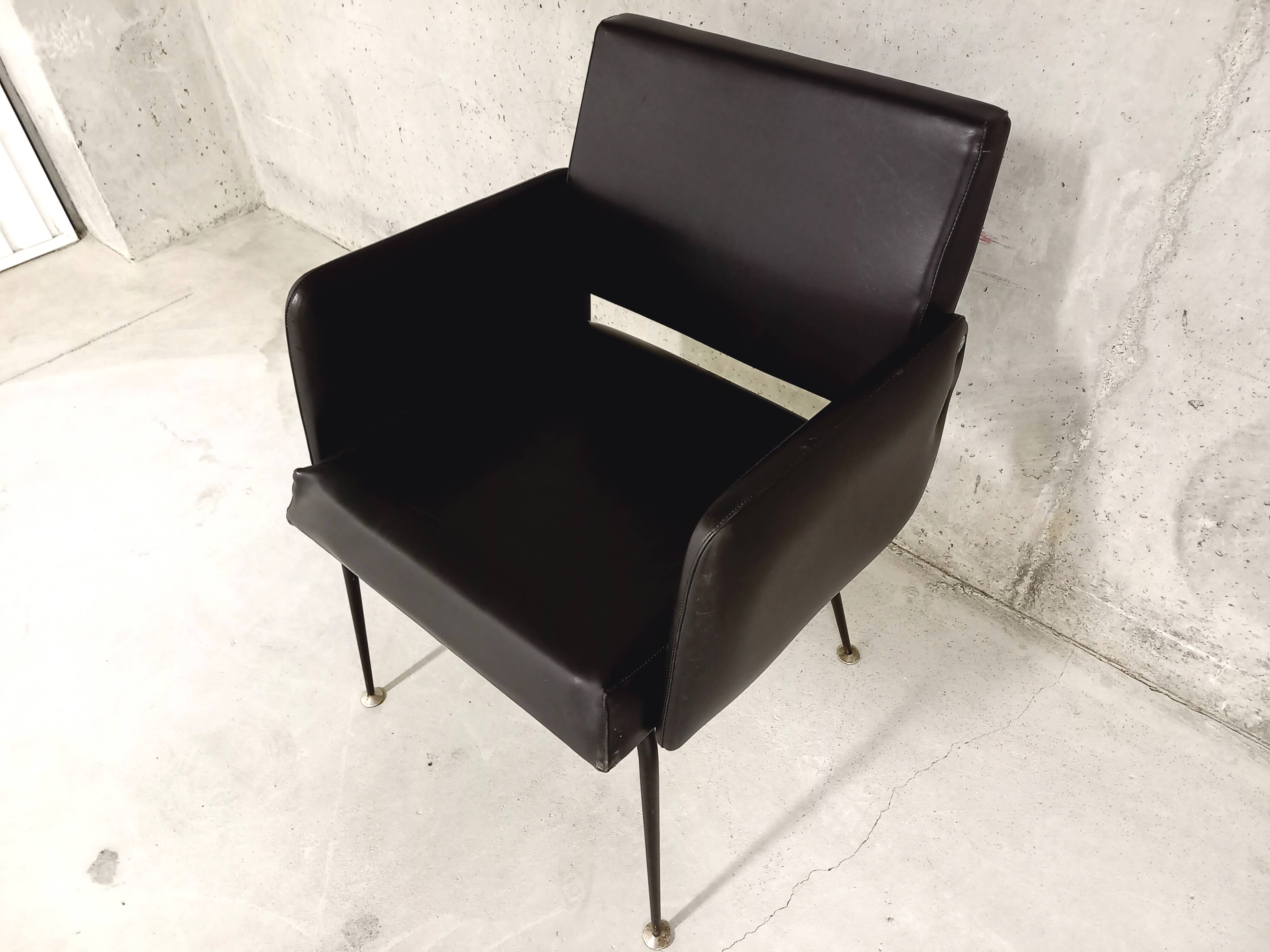 Vintage armchair in skai and black metal 60s