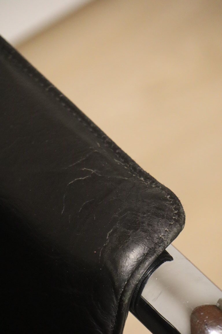 Pair of armchairs in synthetic leather and chromed metal, 1970