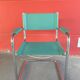 Pair of faux leather and chrome armchairs