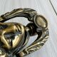 Large antique style brass metal knocker.
