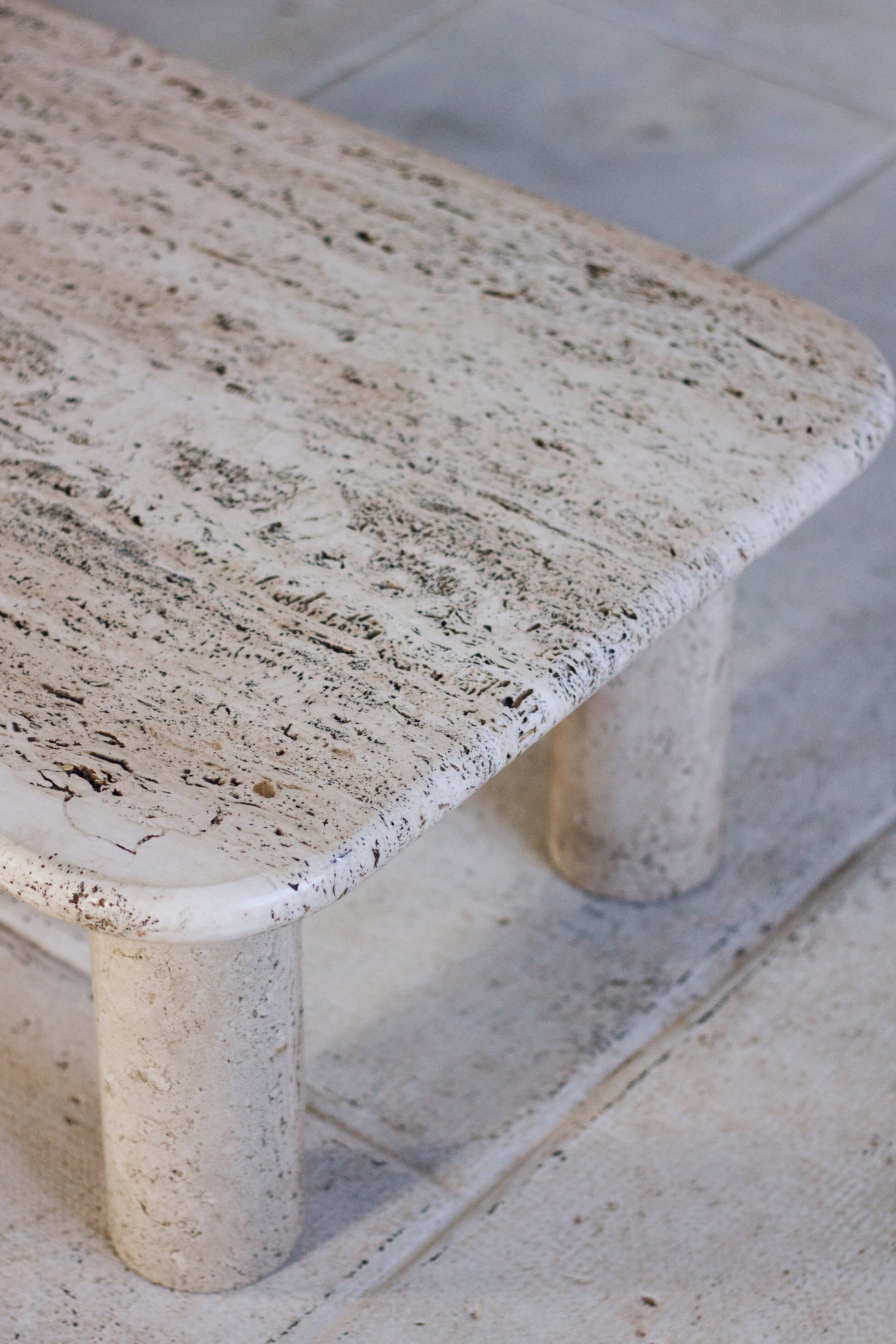 Travertine coffee table in the style of Angelo Mangiarotti, 1970.