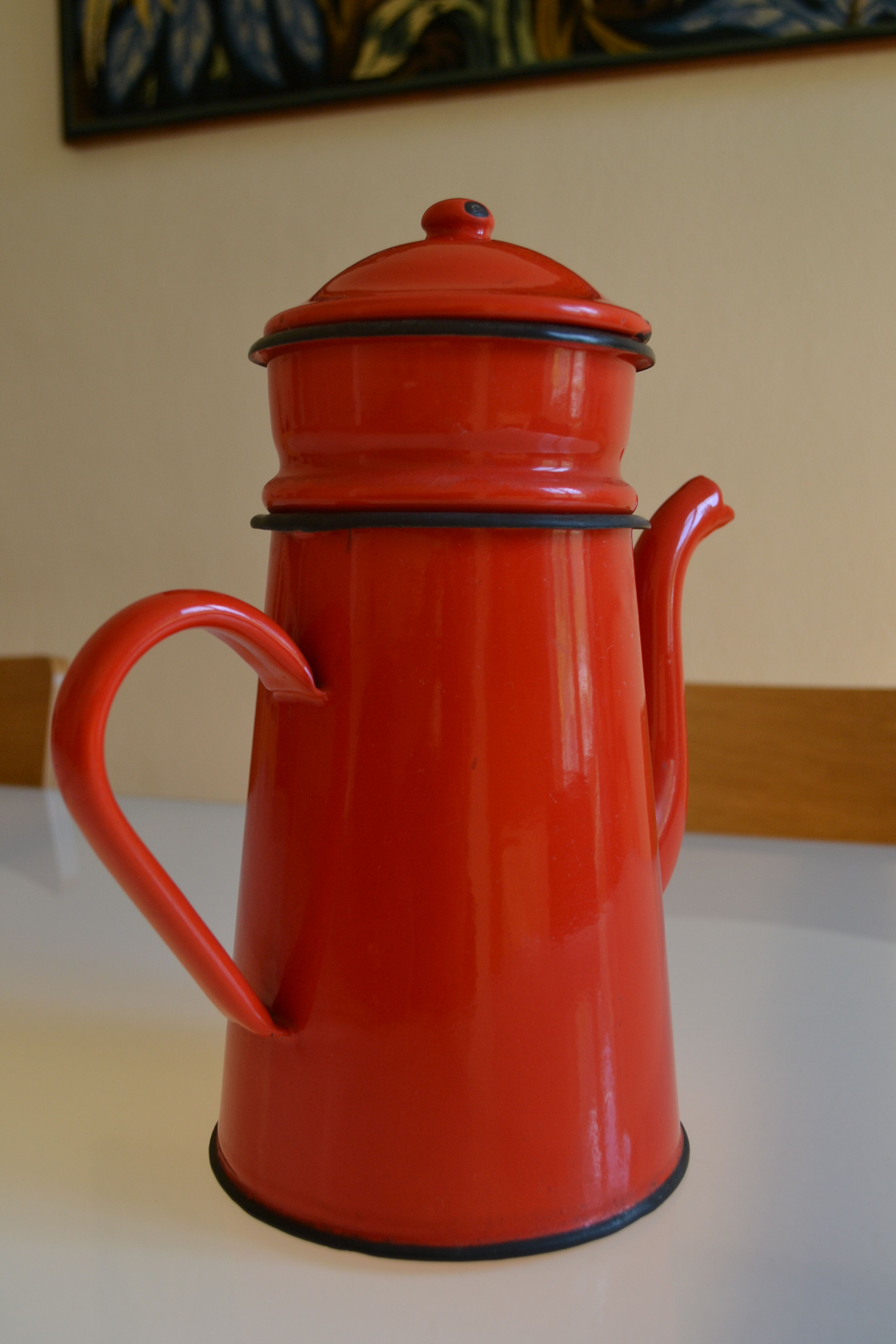 Vintage coffee maker in red and black enamelled sheet
