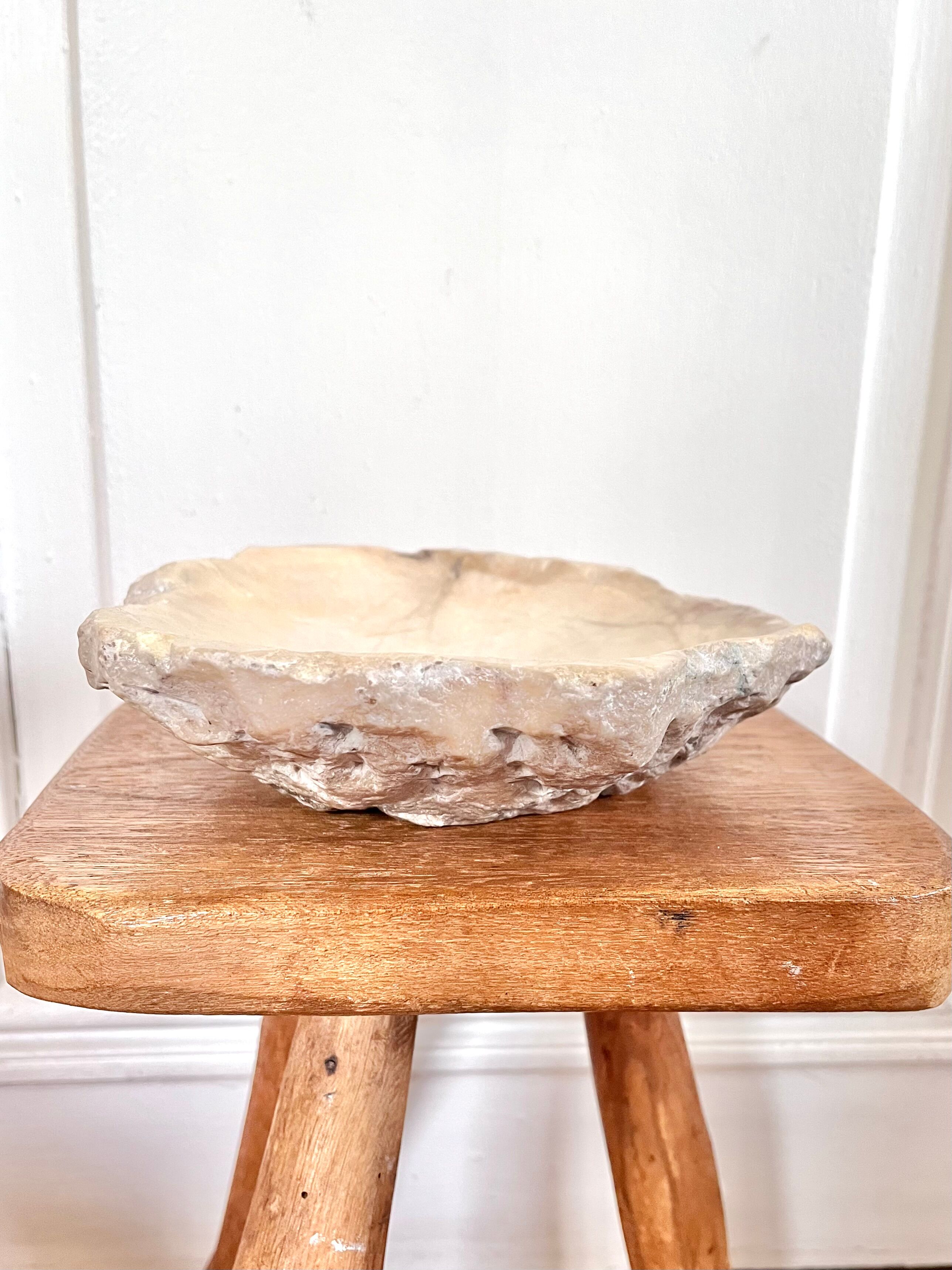 Large ashtray dish made of marbled alabaster.