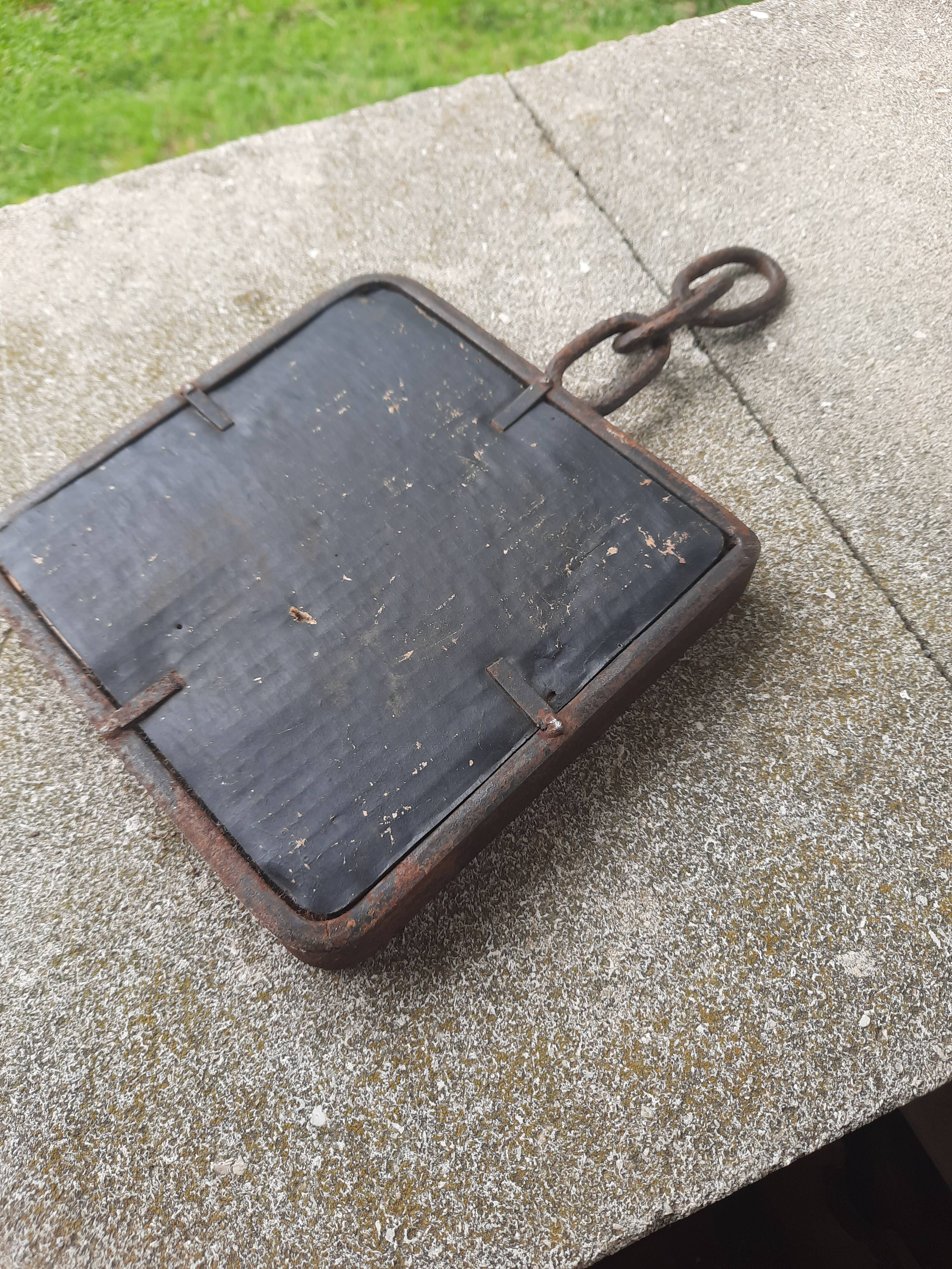 Brutalist cast iron mirror