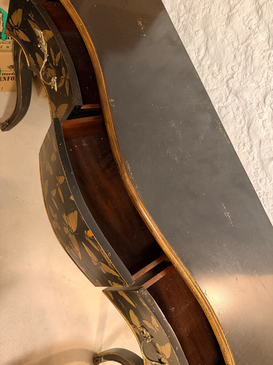 Wooden console painted with butterflies