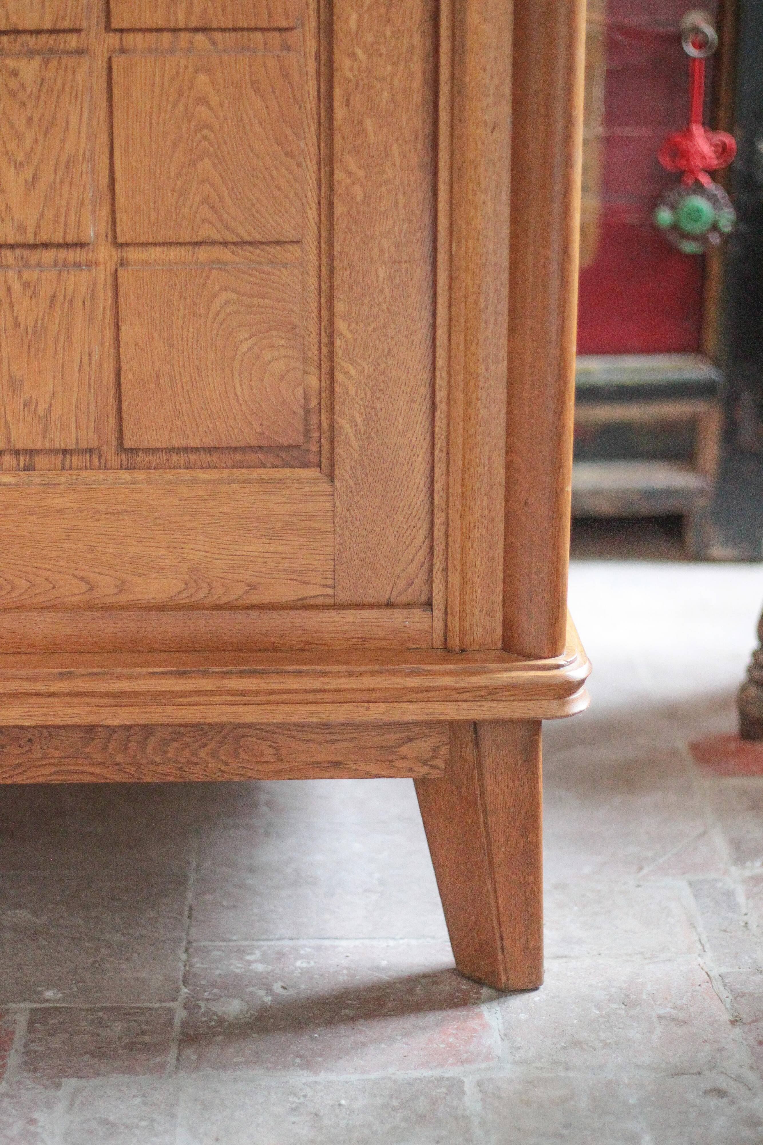 Vintage wooden wardrobe with sliding doors.