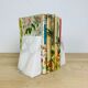 Pair of book greenhouses in alabaster white marble
