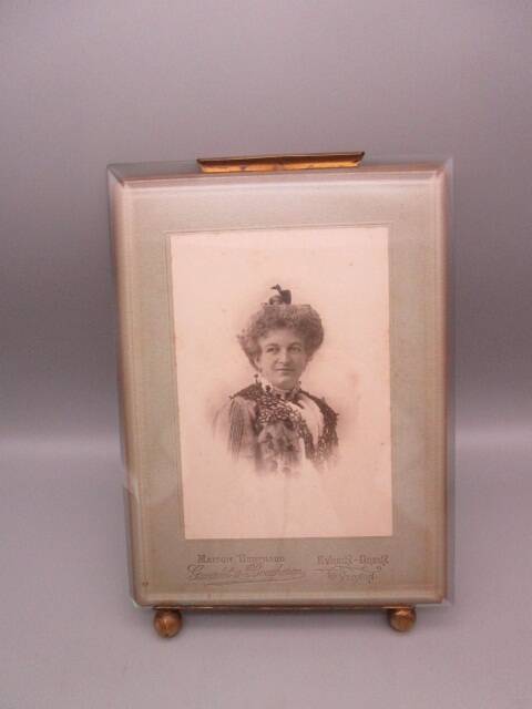 Old frame in brass and beveled glass