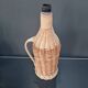 Wicker bottle with handle