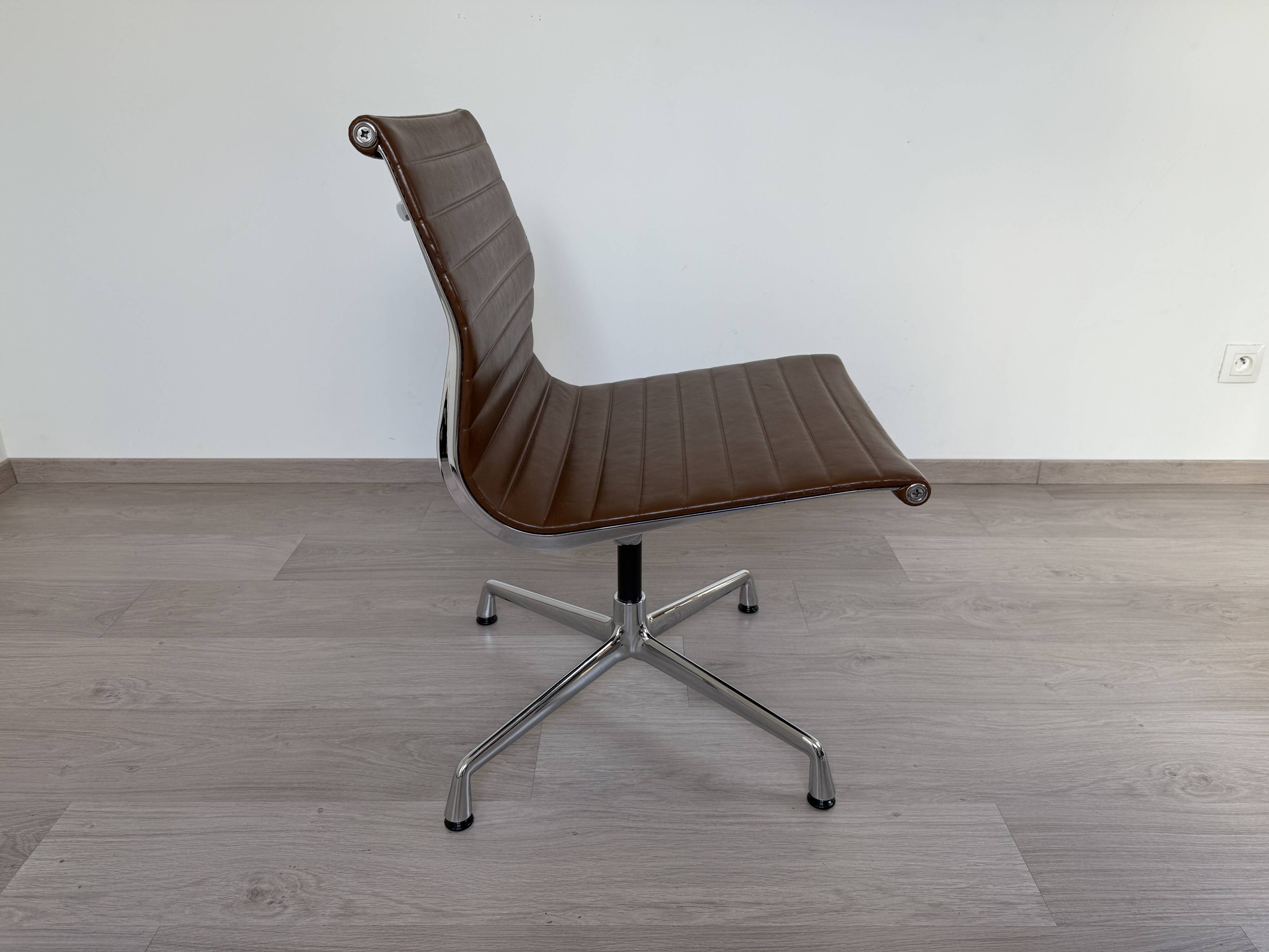 Set of 4 Eames EA105 Vitra armchairs from 2007
