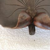 Empty pocket in sculpted wood, signed RUEF