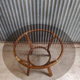 Round rattan table with glass