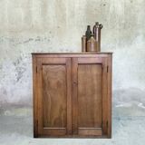 Small wooden sideboard with two doors.