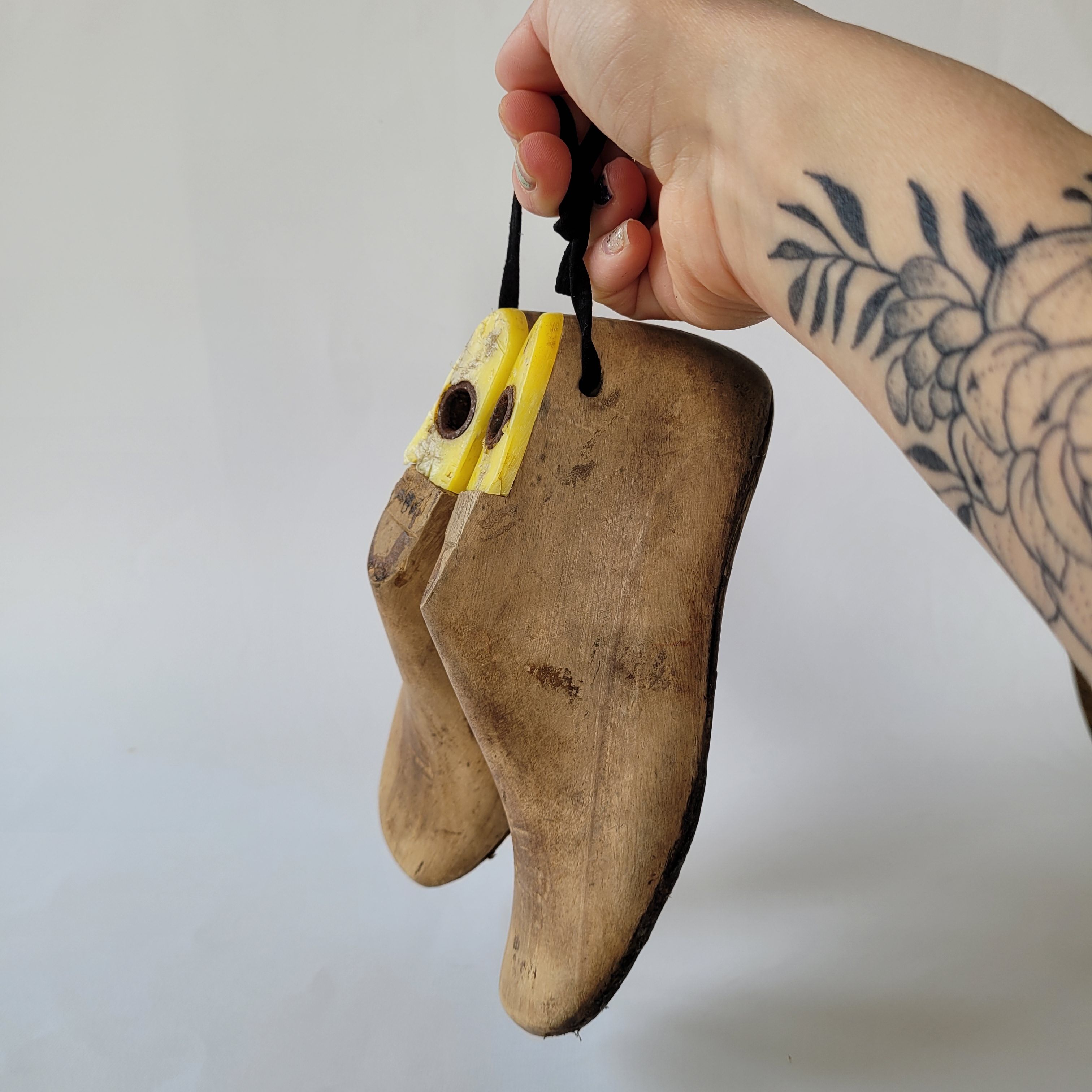 Pair of old wooden shoe shapes
