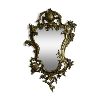 Miroir de style Louis XV, à cadre bronze.